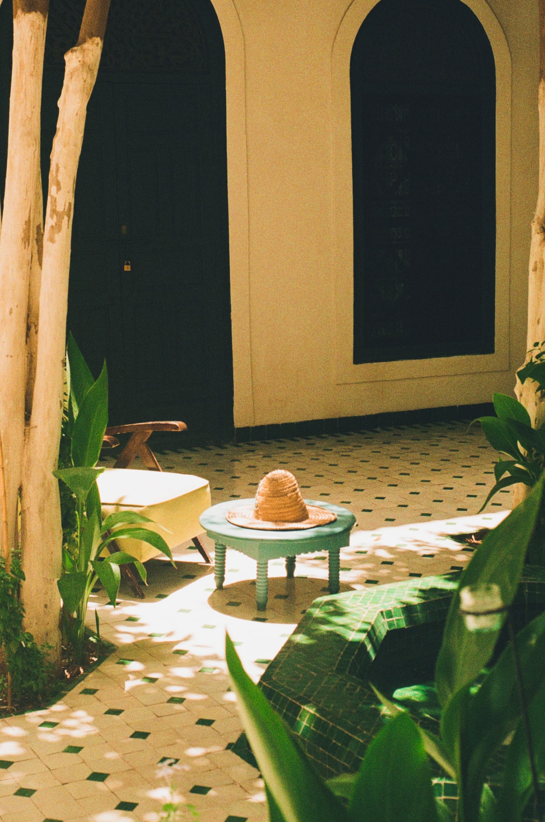 Straw hat, riad courtyard
